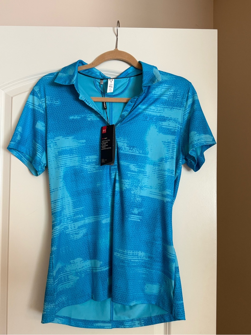 FOUR Under Armour Women’s Golf Tees